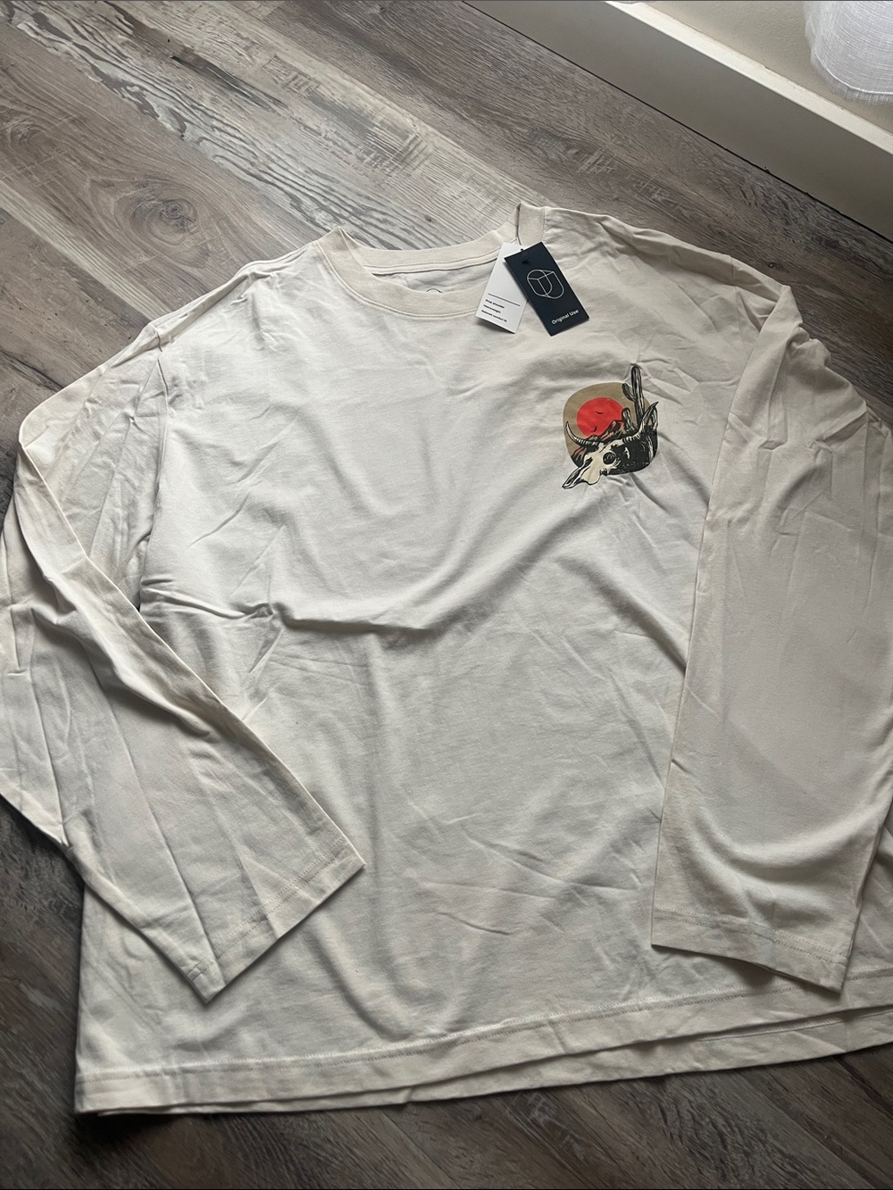 Original Use Cream Long Sleeve Tee with skull Graphic